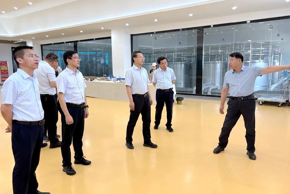 甘肃国投集团到甘肃传祁甘味乳业参观座谈